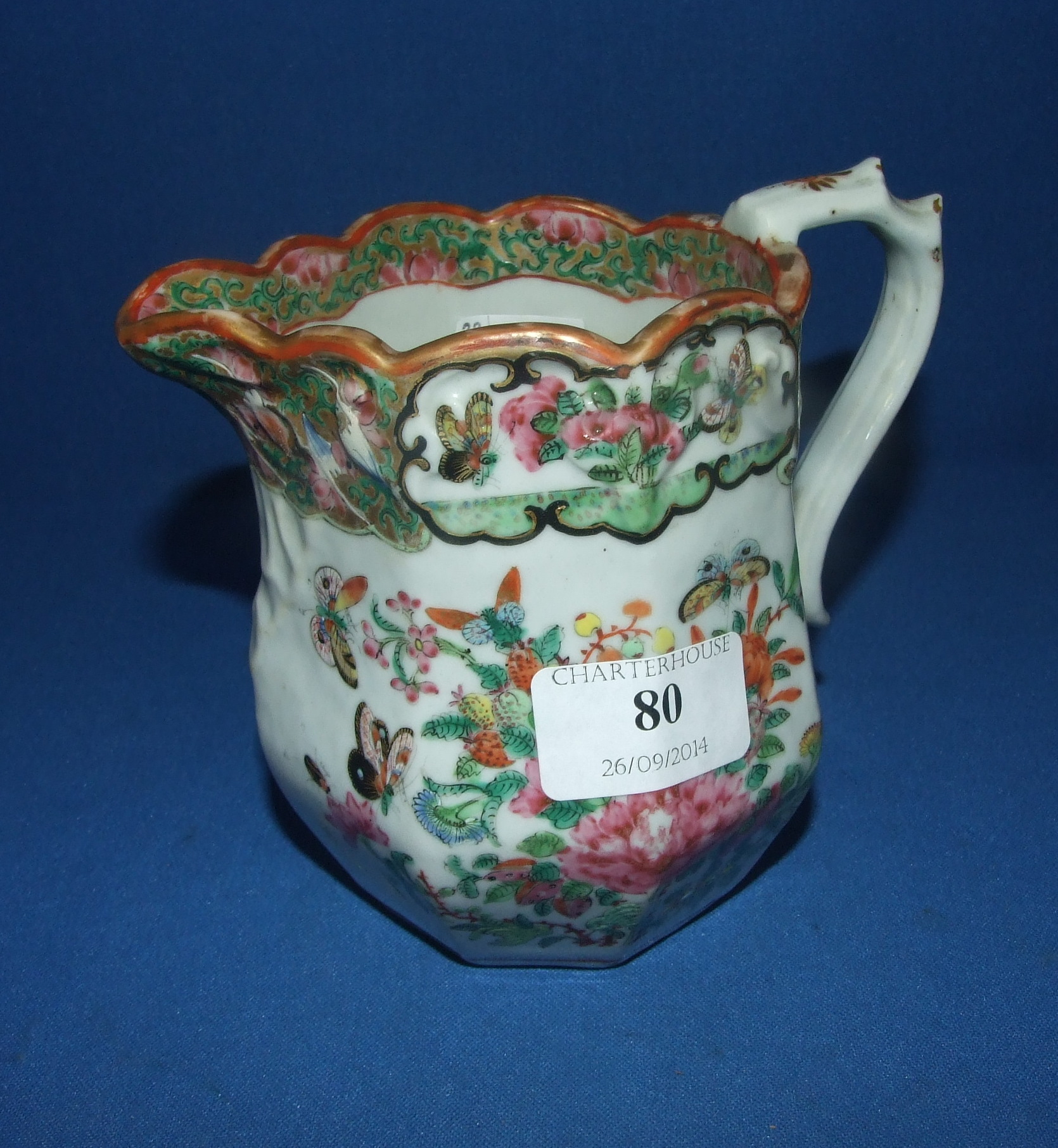 A Cantonese famille rose octagonal jug, 13 cm high