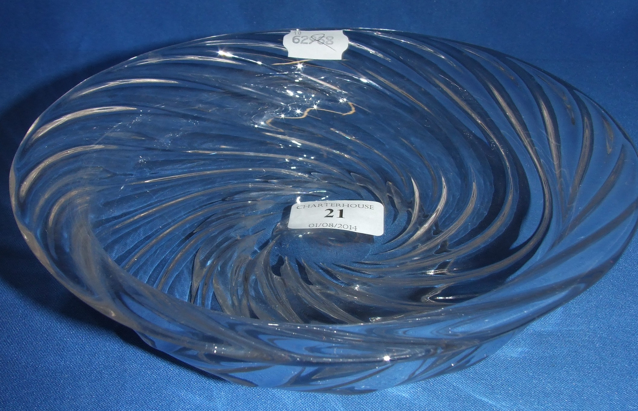 A wrythen clear glass bowl, 22 cm diameter