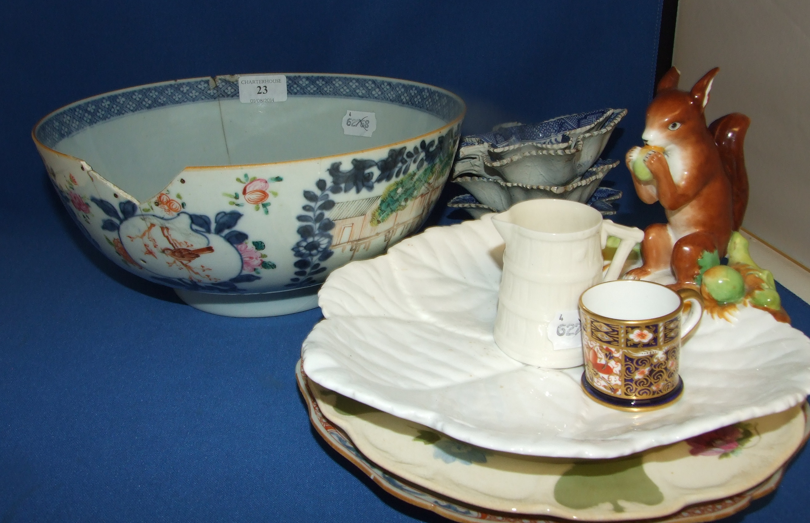 A Chinese porcelain plate, decorated birds and flowers, a similar bowl, four pickle dishes, and