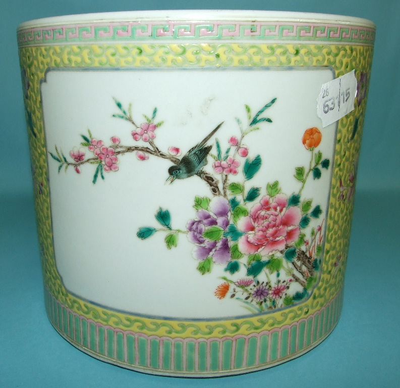 A Chinese cylindrical vase, decorated flowers, 16.5 cm high   Condition report  Report by RB