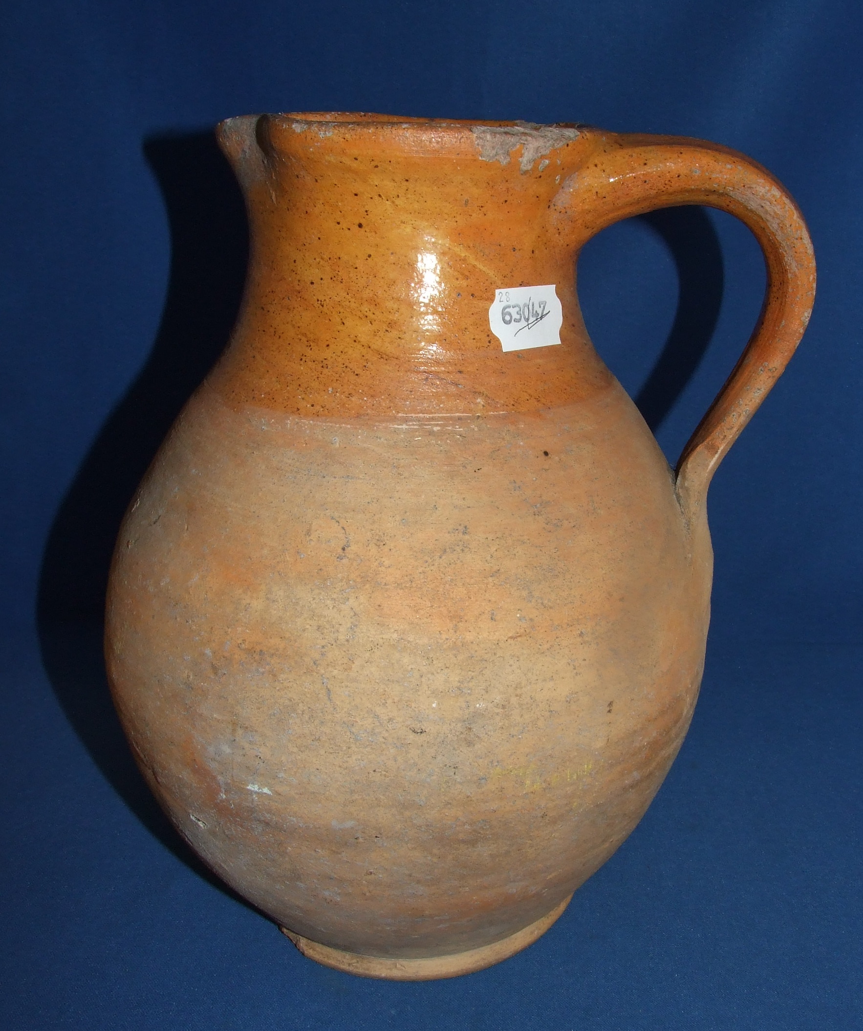 A Verwood style pottery jug, 30 cm high