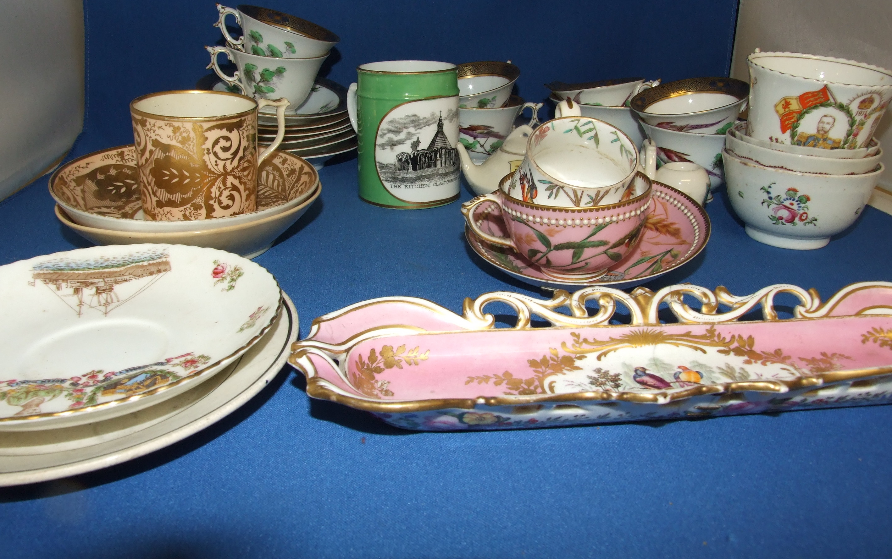 A Graingers Worcester porcelain part tea service, decorated birds, a 19th century souvenir mug,