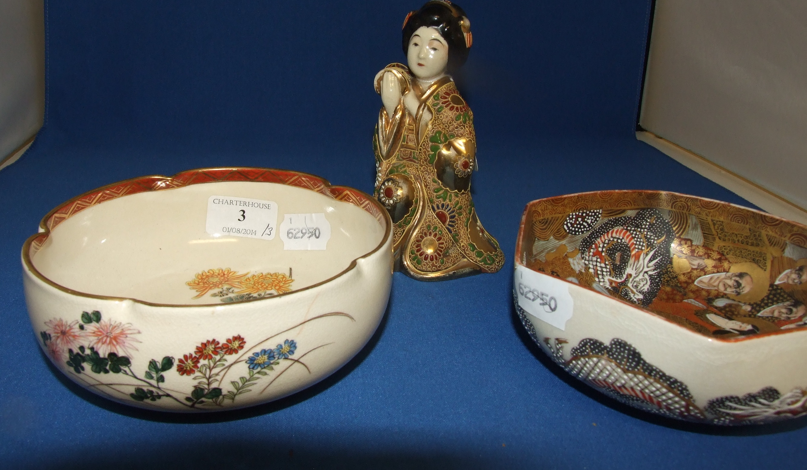 A Japanese Satsuma bowl, 15.5 cm wide, another similar, and a Satsuma figure (a.f.) (3)