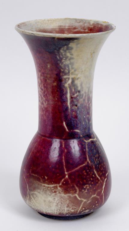 A Ruskin high fired vase, with a sang de boeuf glaze, impressed RUSKIN, 1920, ENGLAND, (cracked)