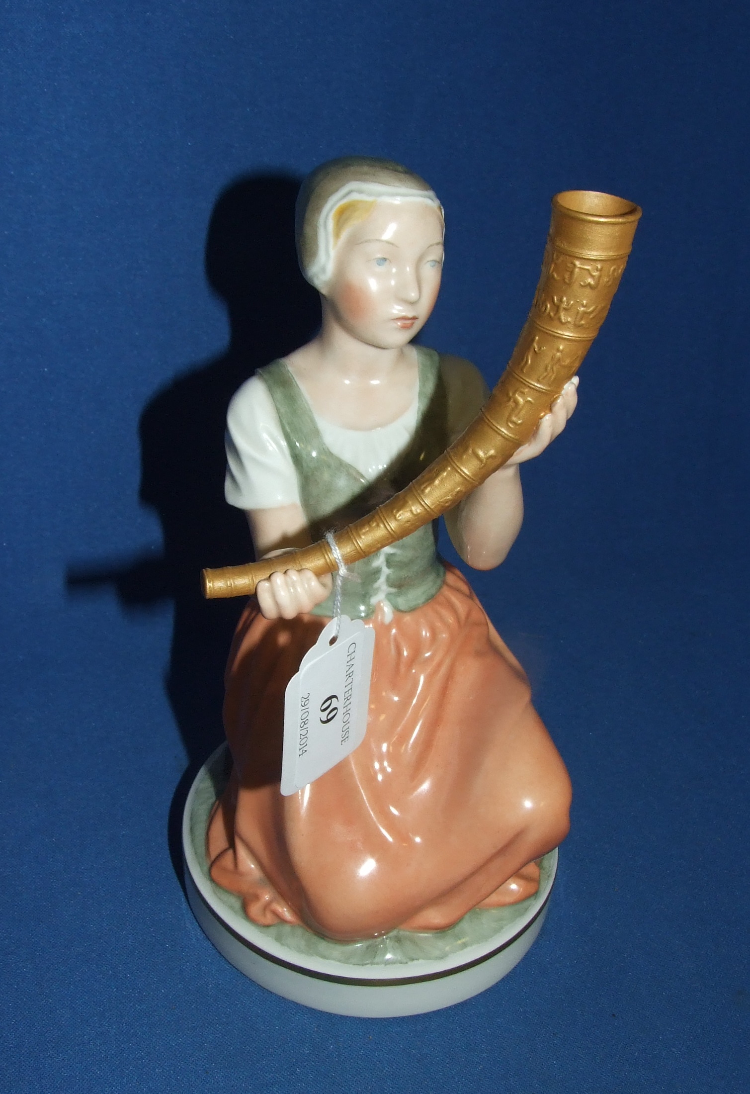 A Royal Copenhagen figure, Girl with the Golden Horn, 12242, 21 cm high   Condition report  Report