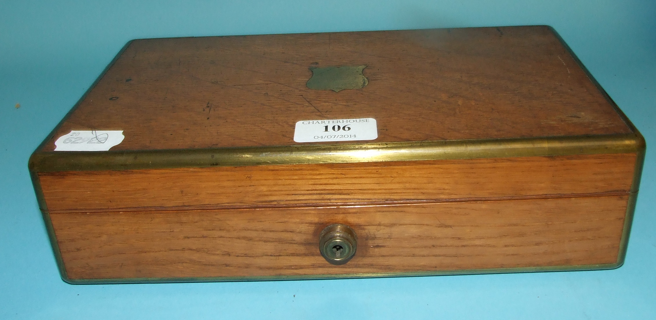 A brass bound oak table cigar box, 28 cm wide