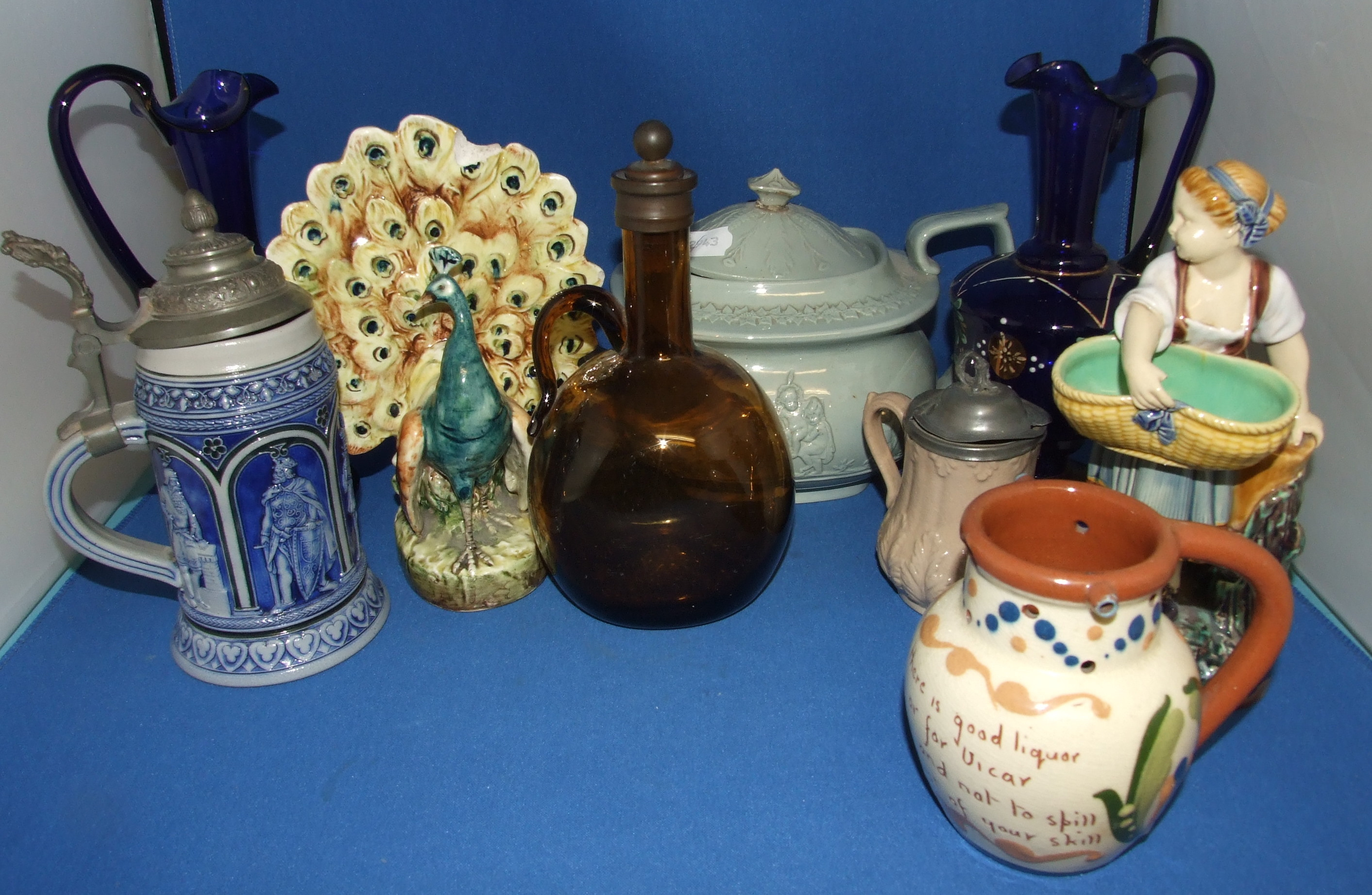 A Victorian Minton majolica figure, holding a basket (lacks thumb), other ceramics and glass (7)