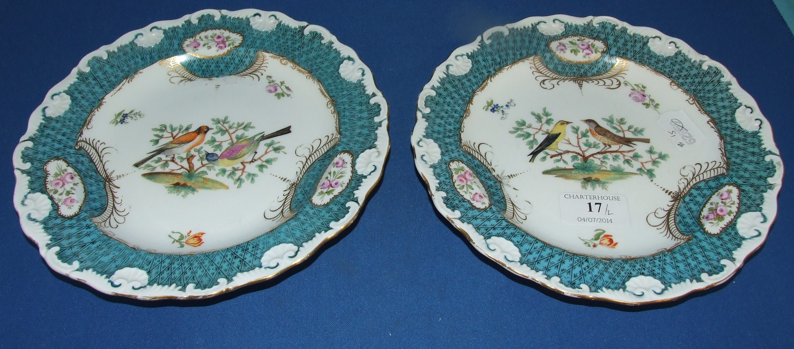A pair of Dresden porcelain plates, decorated birds, 21.5 cm diameter (seconds) (2)