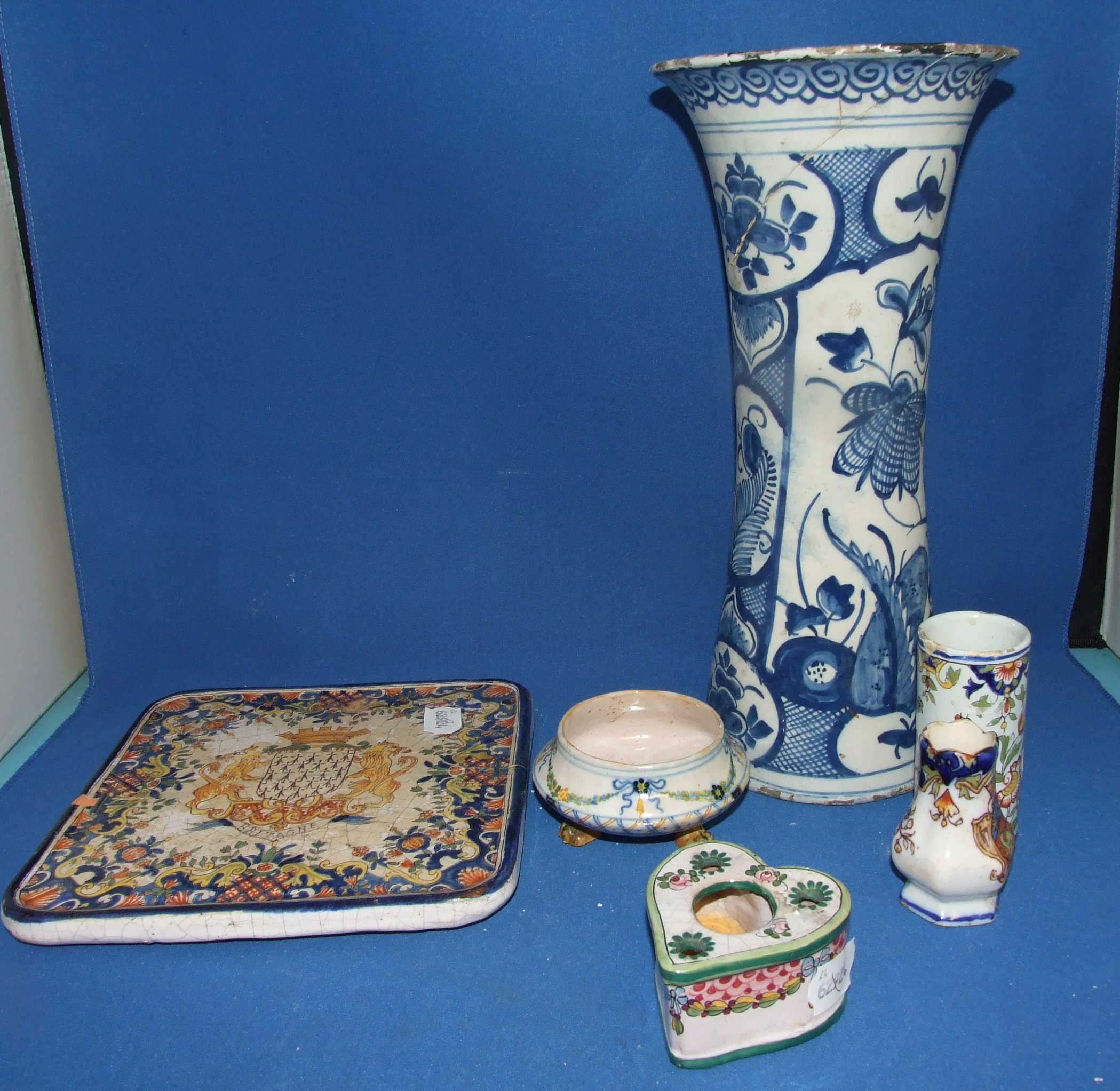 A Delft sleeve vase, decorated flowers, 32.5 cm high, and other tin glazed earthenware (a.f.) (box)