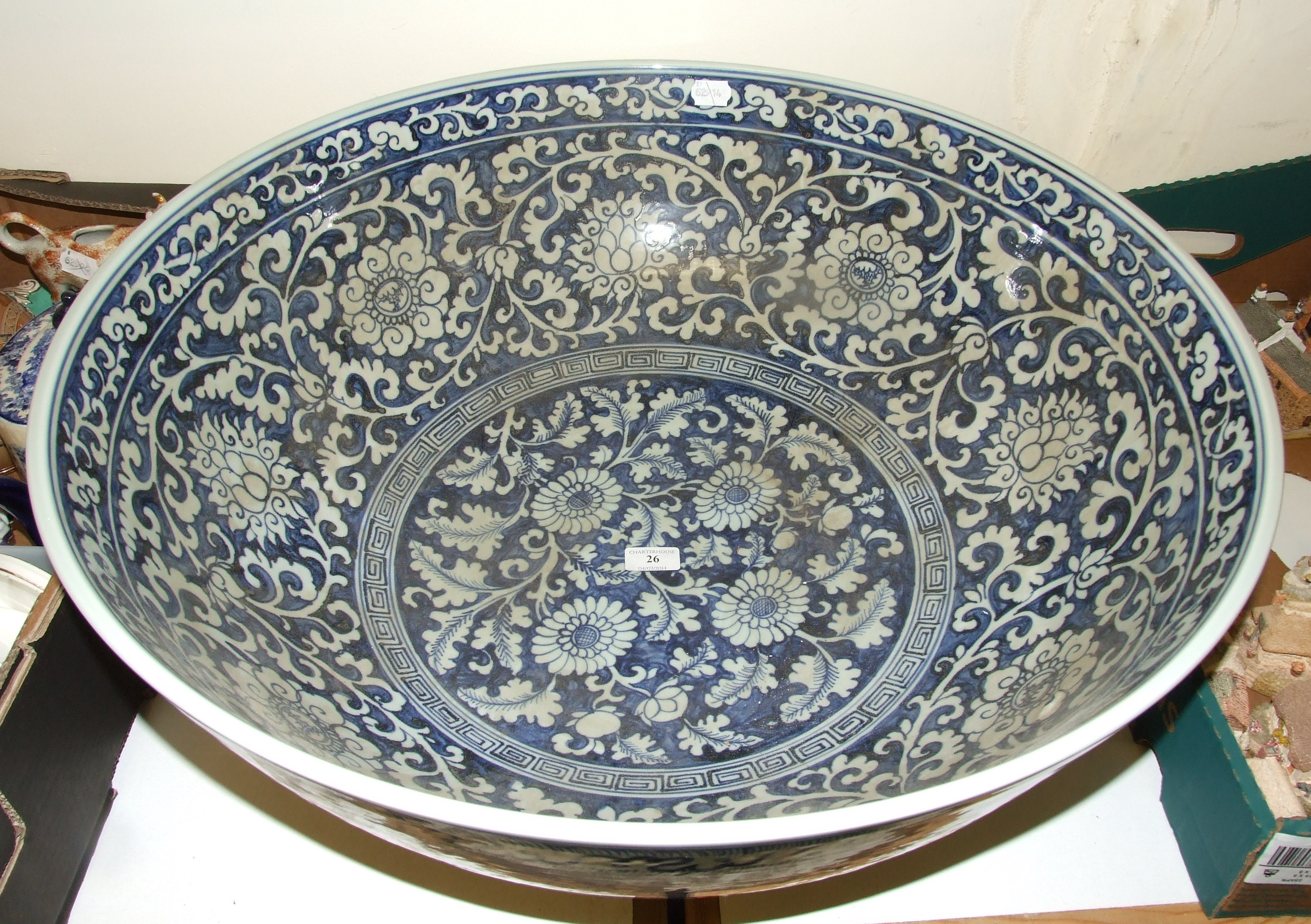 A large Chinese bowl, decorated scrolling foliage, 65 cm diameter   Condition report  Report by NG