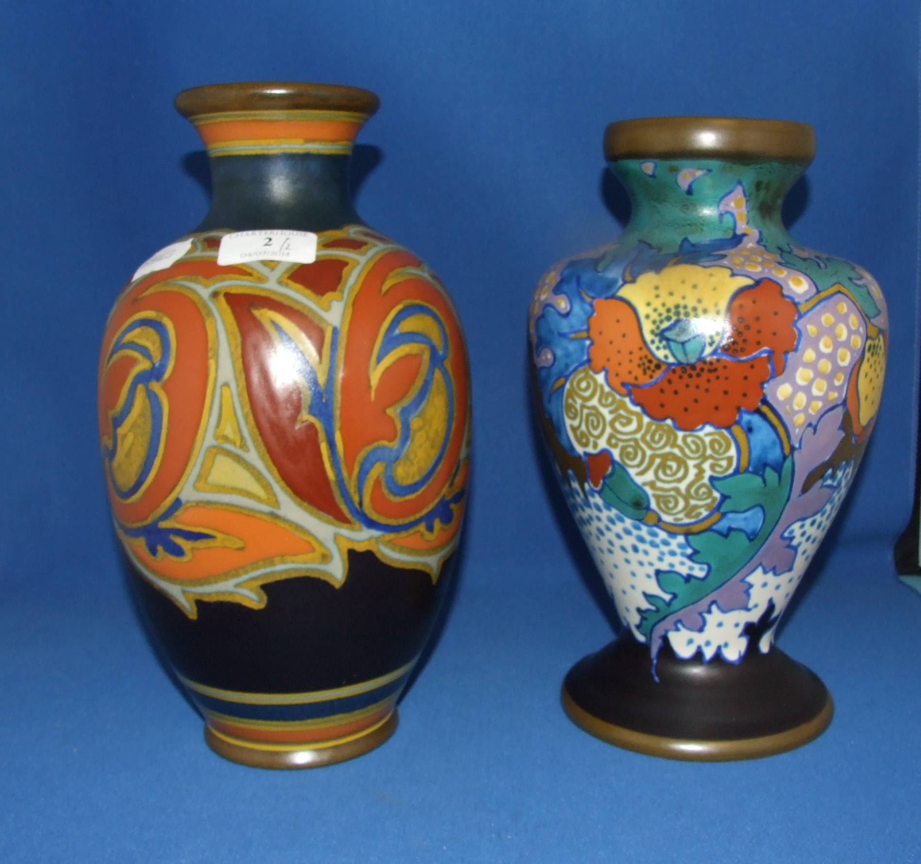 A Gouda pottery Verat pattern vase, 988/2648, 27.5 cm high, and another, Bluemen pattern, 8180/