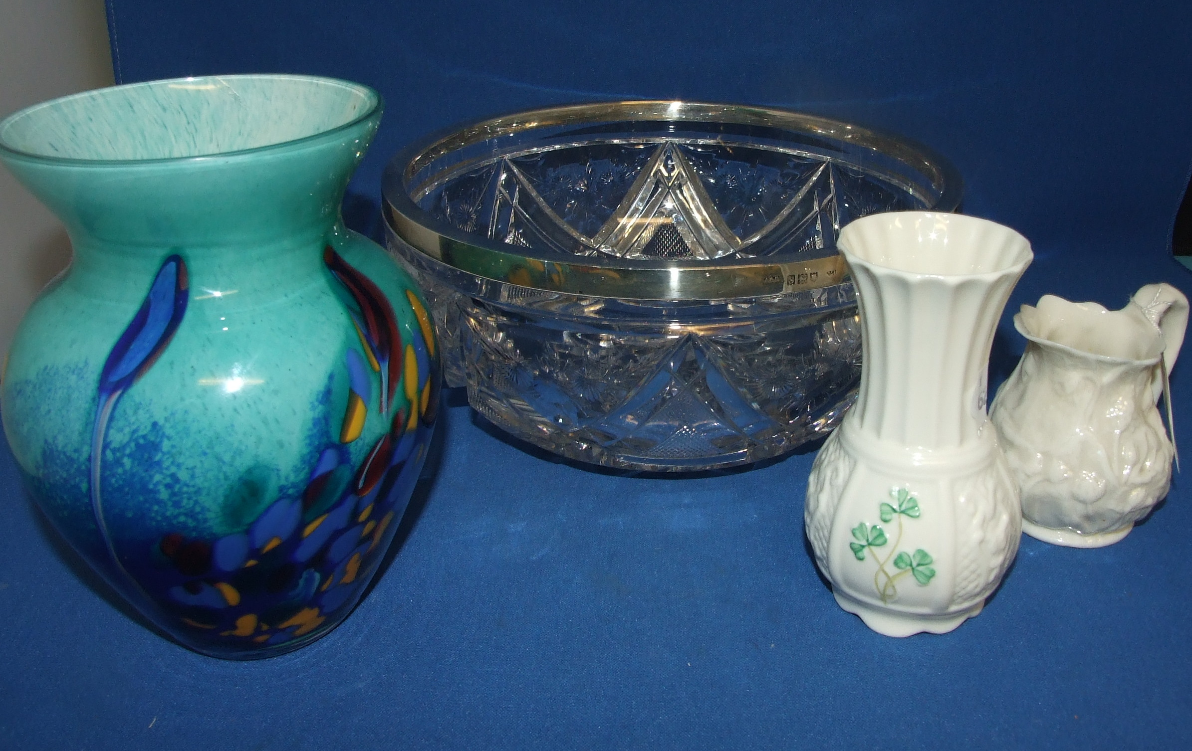 A La Rochere glass vase, 16 cm high, a Belleek vase, a similar jug (chipped), and a silver mounted