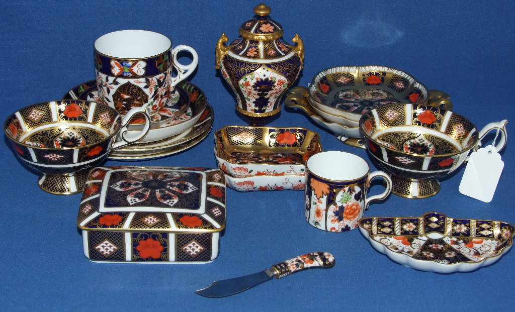 A pair of Royal Crown Derby Imari cups and saucers, 1128, three matching plates, 26.5 cm wide, other