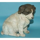 A late 19th century terracotta figure, of a puppy (slightly chipped), 15 cm high