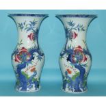 A pair of Chinese porcelain vases, decorated flowers and foliage, 35 cm high (2) Report by NG  A