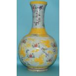 A Chinese vase, decorated birds, insects, flowers and foliage, 51 cm high Report by NG  Modern vase.
