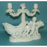A Continental porcelain candelabrum group, of a chariot, cherub and lion (a.f.), 24 cm high
