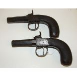 A pair of early 19th century percussion cap muff type pistols, inscribed C & J Gourlay, Glasgow,