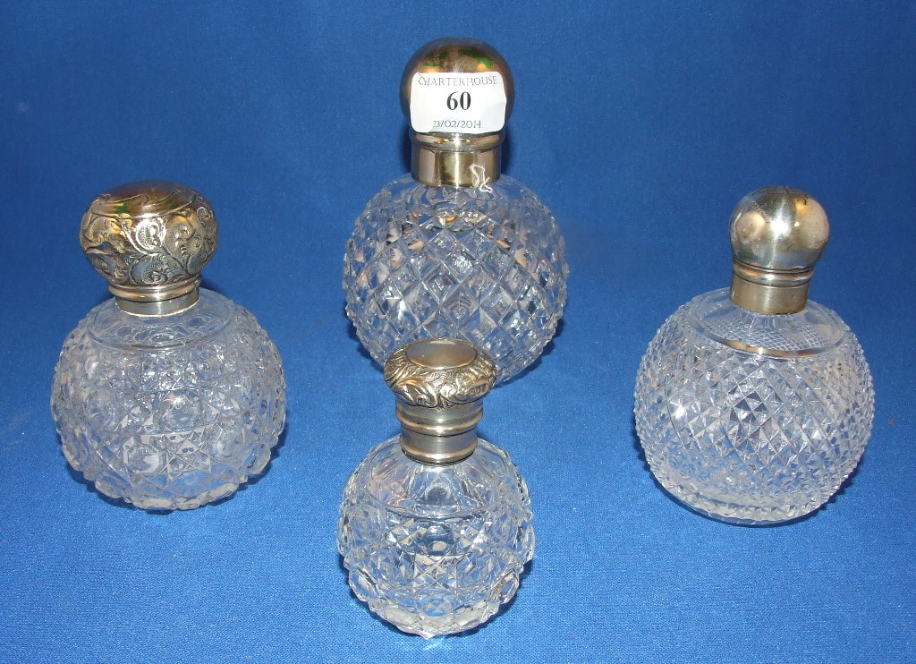Four silver and cut glass scent bottles (a.f.) (4)
