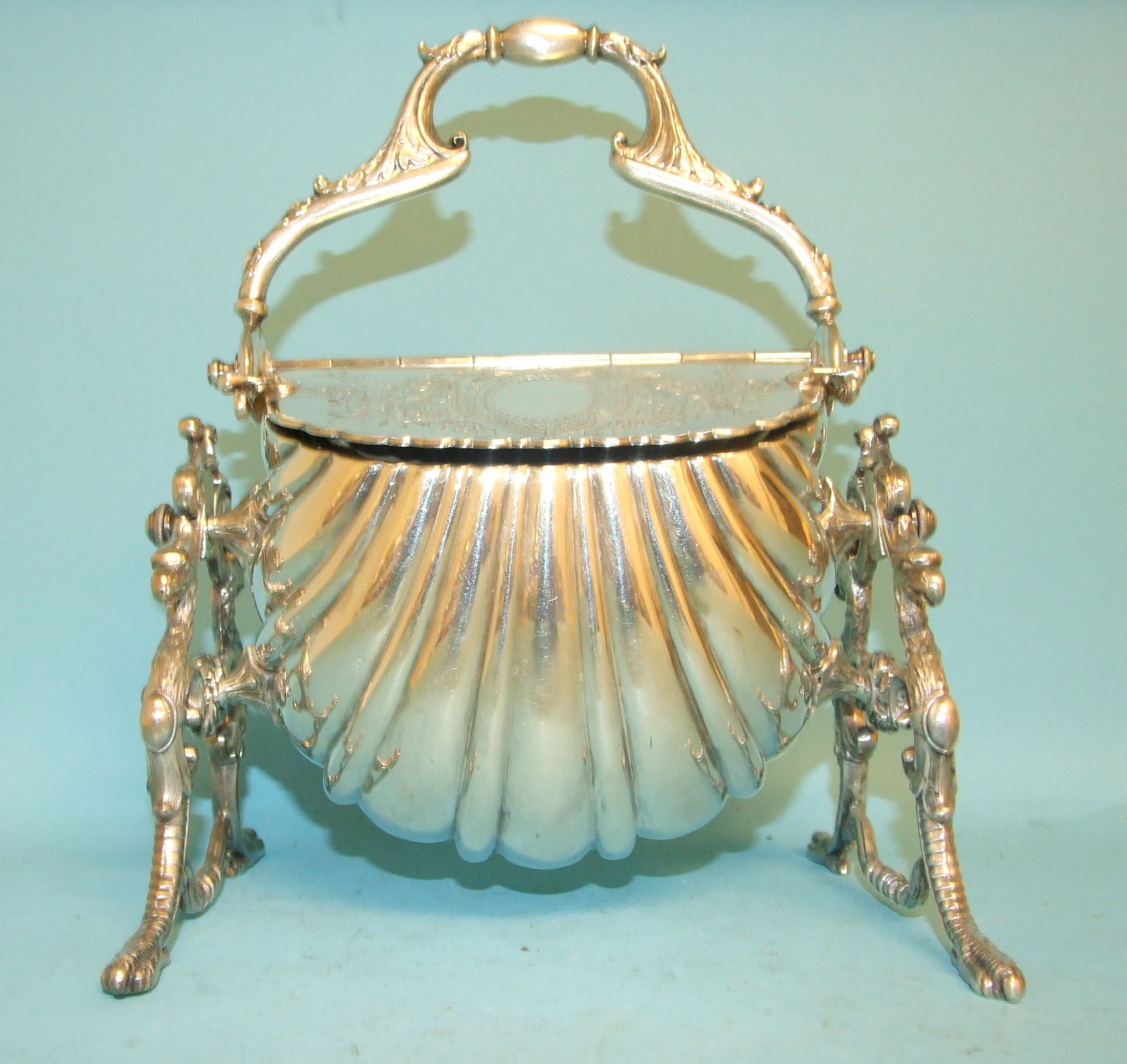 A silver plated entree dish