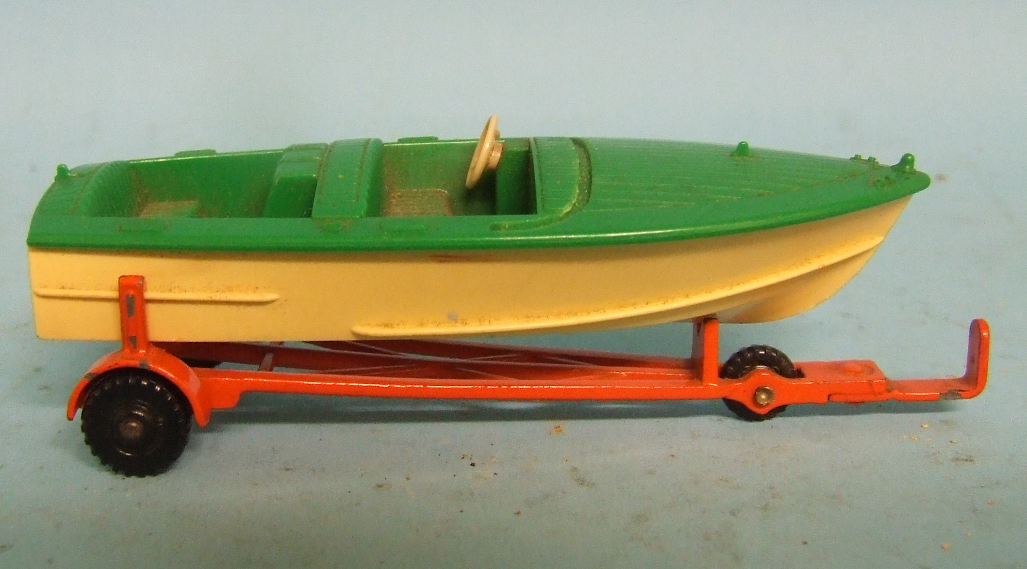 Assorted Corgi, Dinky and other die-cast toys, including a Dinky Toys Healey Sports Boat, and