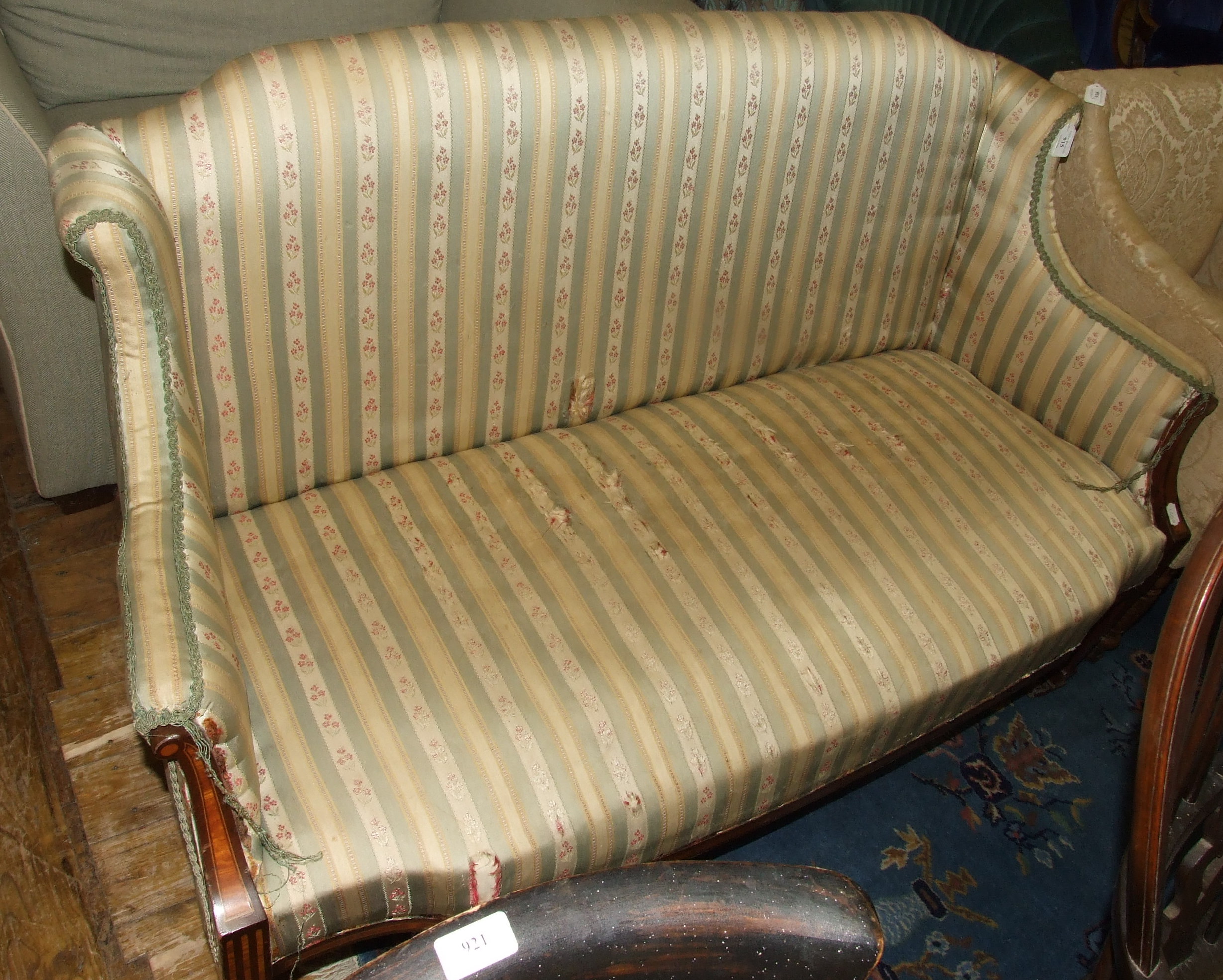 An Edwardian inlaid mahogany two seater settee