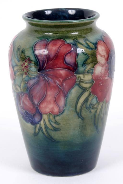 A Moorcroft pottery Anemone pattern vase, 12.5 cm high  See illustration