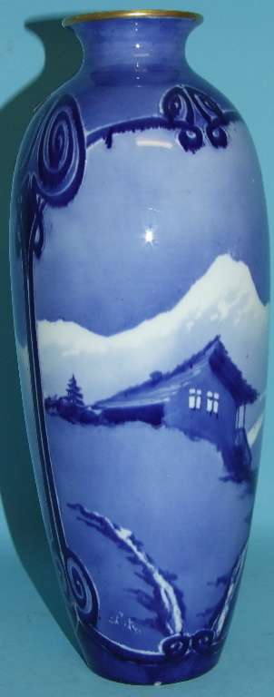 A Royal Doulton style vase, decorated a chalet in a mountain, 29.5 cm high Condition report Report