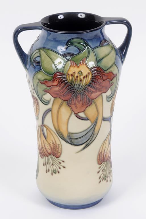 A Moorcroft pottery Anna Lilly pattern two handle vase, the base with WM monogram, 25.5 cm high  See