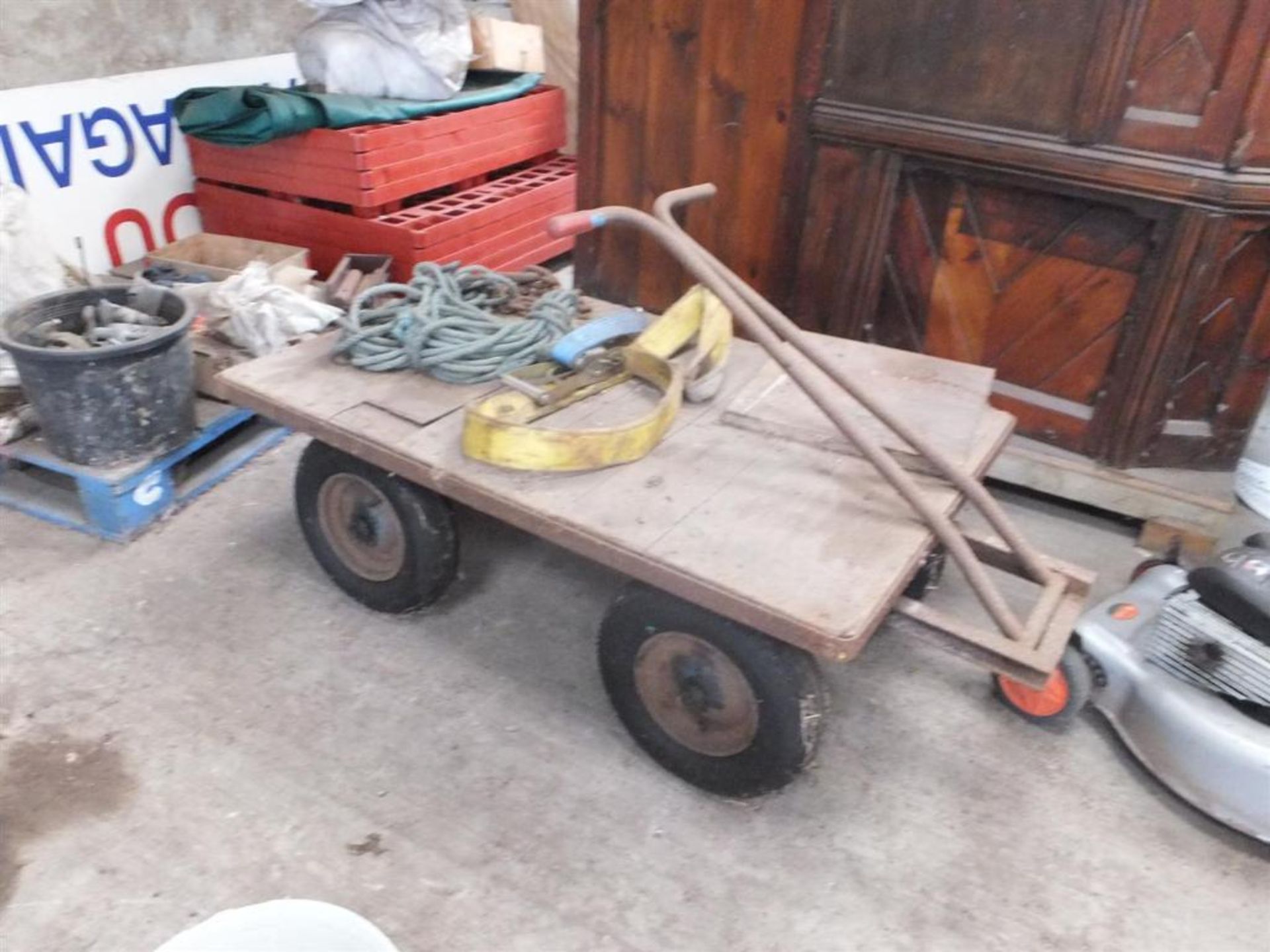 Four wheeled wooden trolley on pneumatic tyres