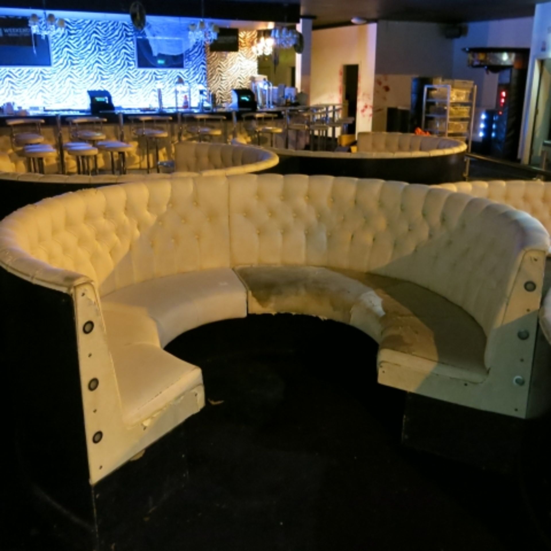 Cream Circular Button Back Seating Unit c/w 6 Spot Light Built in Unit, some damage.