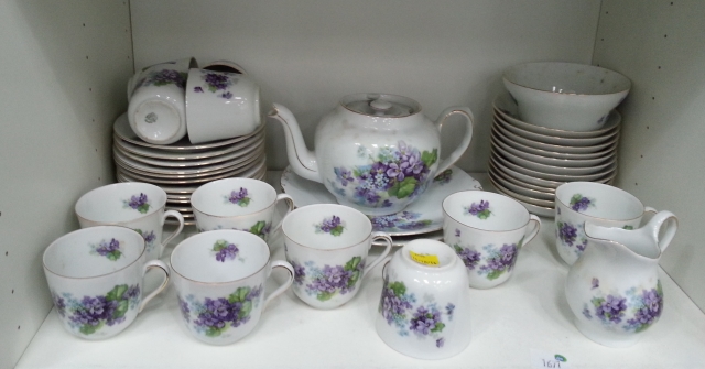 "Click here to bid.  Victoria Czechoslovakian` Tea Service decorated with Violets together with `