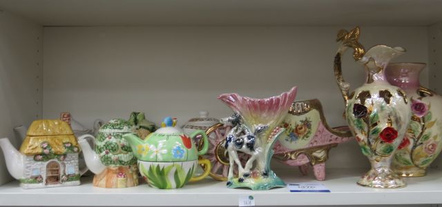 "Click here to bid.  Six Novelty/Teapots, Continental large Wheelbarrow Jardiniere, Belgian Jug &