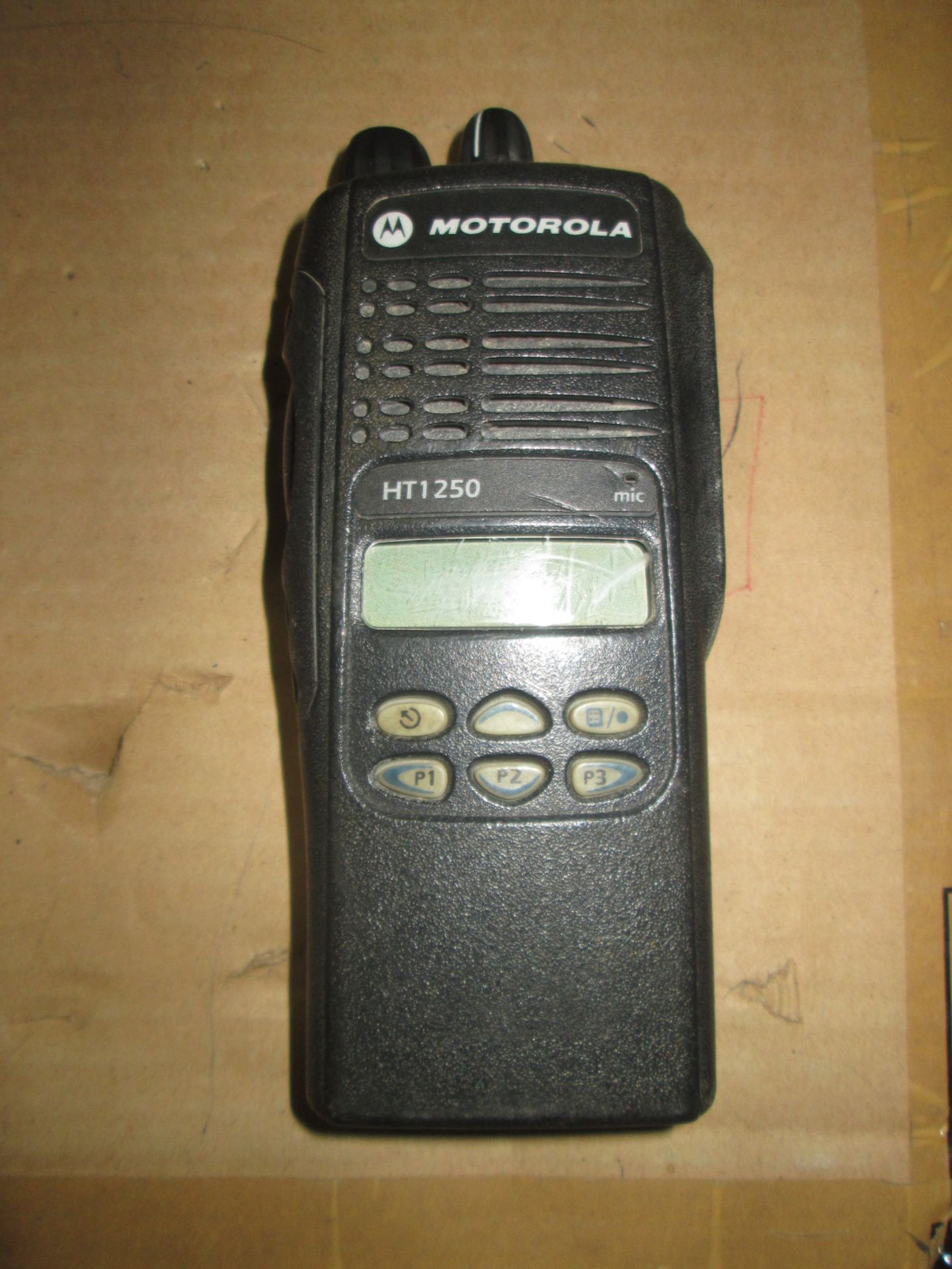 MOTOROLA HT1250 136-174 1-5W 128 CH HANDHELD RADIO ID#: AC010 (LOCATED IN BROCKVILLE, ON)