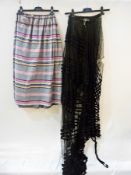 Various Victorian skirts including a black net and satin overskirt, a 1920's white tennis dress with