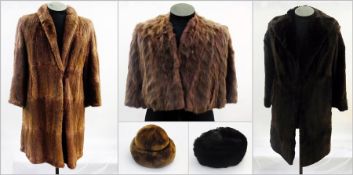 A vintage fur long coat, another brown fur coat, a short fur jacket, a Russian fur hat and other