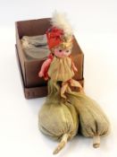 An early 20th century plastic lavender Kewpie doll, in box
