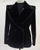 A 1960's Gentleman's black velvet jacket believed to be made for Elton John, with extremely wide