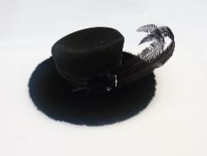 A Philip Somerville black faux-fur and felt hat with two feathers, in original Philip Somerville hat