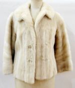 Short blonde mink jacket, size medium, pale grey lining, embroidered with initials to lining "K.