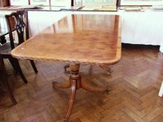 A Rackshaw reproduction yew wood double-pedestal dining table, with reeded border, on turned