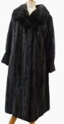 Black mink full length coat, approx. size 18-22, black patterned lining