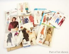 A large quantity of dress patterns, Vogue, Simplicity, McCall's, etc. and other pieces (2 boxes)