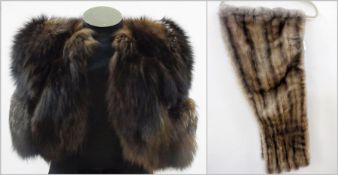 A grey mink stole together with a fox jacket labelled The National Fur Company Limited