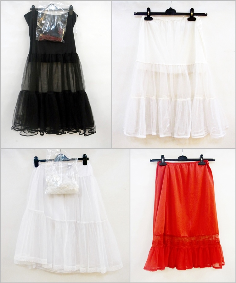 A black tulle full-length waist petticoat, three other tulle waist petticoats, one white lace