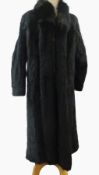 Black mink full length coat, with black Arctic fox collar trim, labelled "Fur Club - Collection by