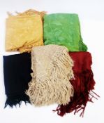 A Chinese yellow crepe embroidered shawl with deep fringe, a Chinese green silk embroidered shawl, a