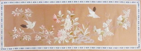 Chinese embroidered panel with birds and foliage on peach coloured background