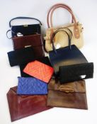 A selection of bags including a lizard skin brown leather bag, a black crocodile(?) bag and