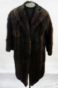 A vintage fur coat, possibly coney